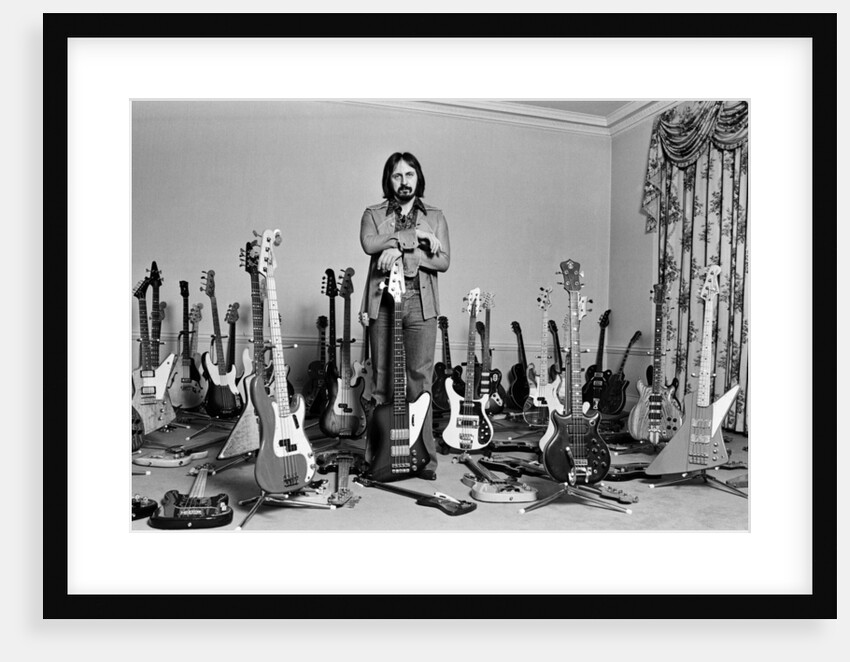 John Entwistle with bass guitars by George Phillips