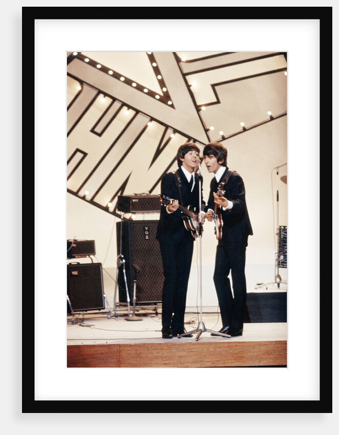 Paul McCartney and George Harrison by Staff