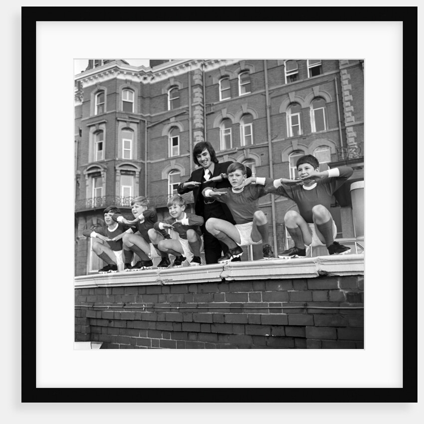 George Best with kids, Blackpool, 1970 by Staff