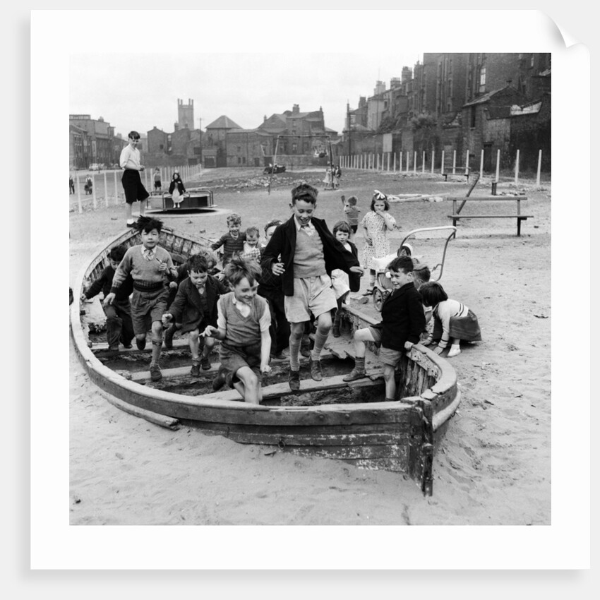 Liverpool children playing in a WW2 bomb site, 1954 by Turner