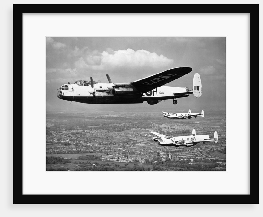 Lancaster in flight by Topix