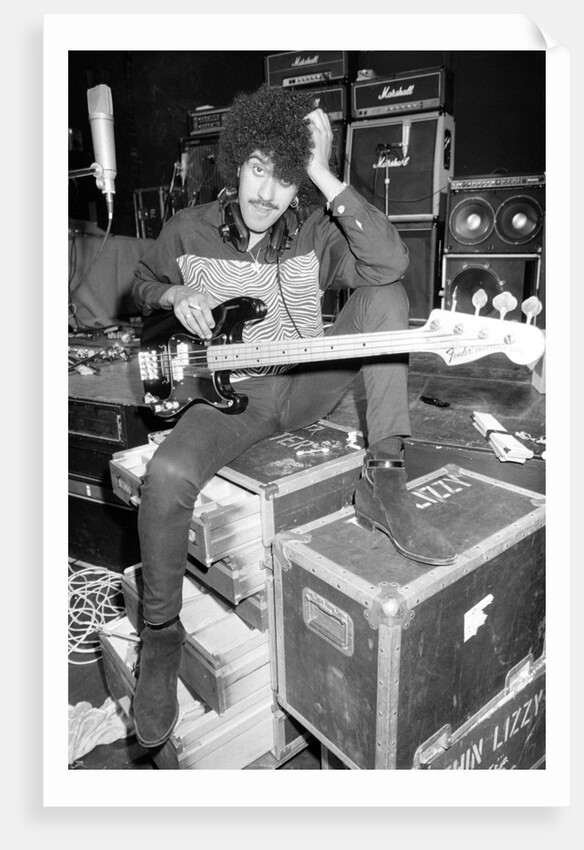 Phil Lynott of Thin Lizzy during a recording session for the groups new album. by Andy Hosie