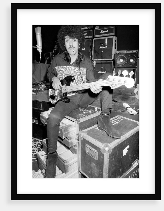 Phil Lynott of Thin Lizzy during a recording session for the groups new album. by Andy Hosie