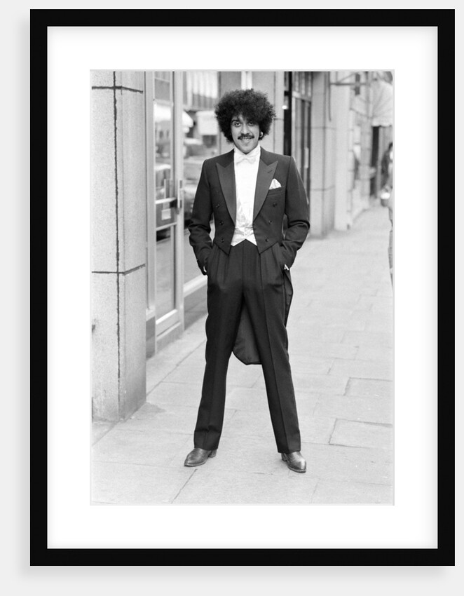 Phil Lynott in London, modelling clothes from Saville Row. 1983 by Mike Maloney