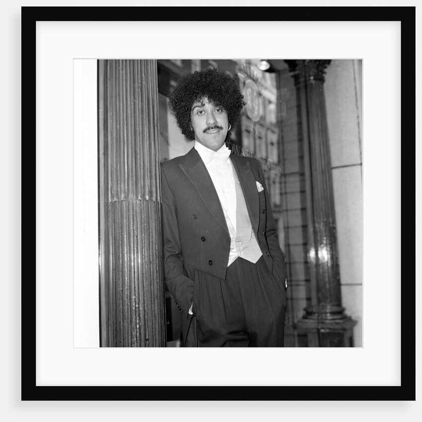 Phil Lynott in London, modelling clothes from Saville Row. 1983 by Mike Maloney