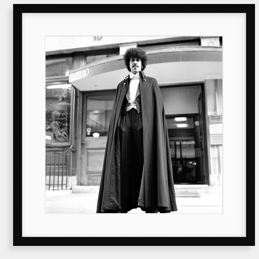 Phil Lynott in London, modelling clothes from Saville Row. 1983 by Mike Maloney