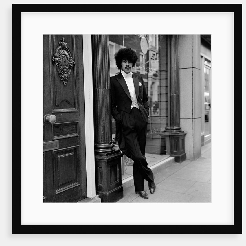 Phil Lynott in London, modelling clothes from Saville Row. 1983 by Maloney