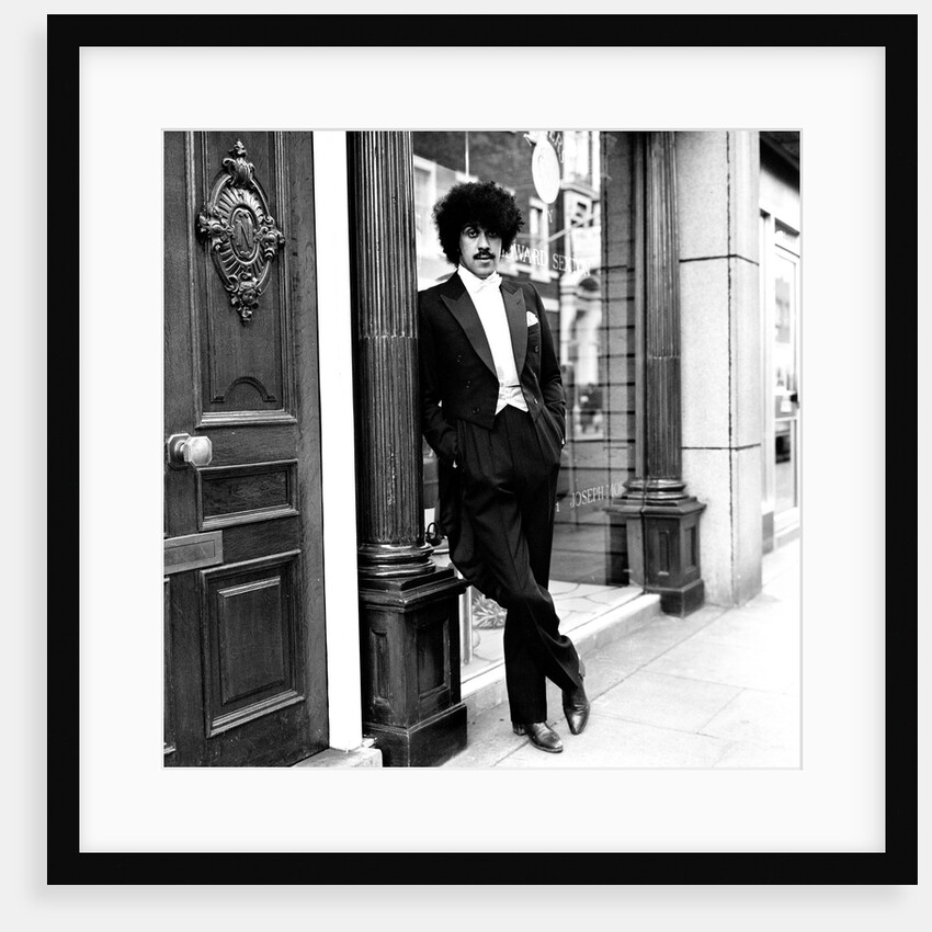 Phil Lynott in London, modelling clothes from Saville Row. 1983 by Maloney