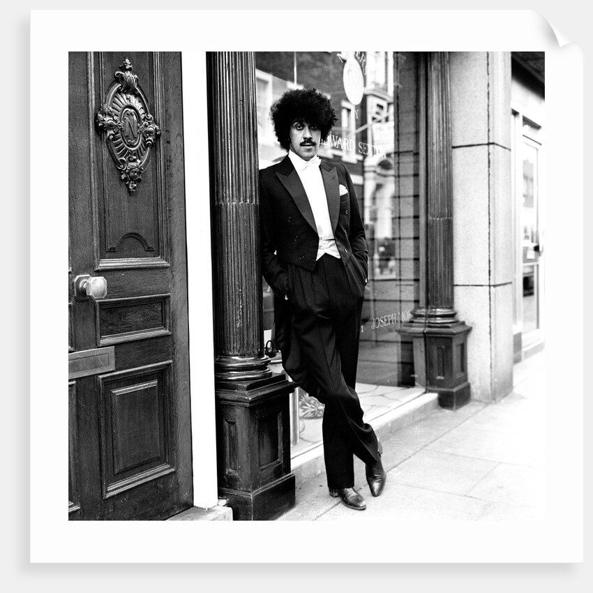 Phil Lynott in London, modelling clothes from Saville Row. 1983 by Maloney