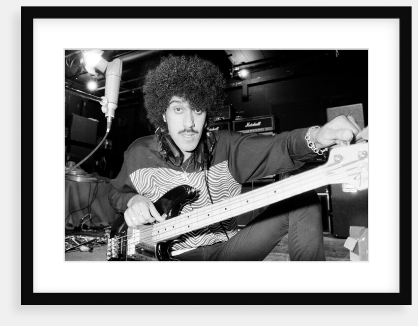 Phil Lynott of Thin Lizzy during a recording session for the groups new album. by Andy Hosie
