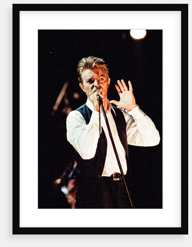David Bowie performing at The Birmingham NEC, as part of his 1990 Sound and Vision World Tour. by Dick Williams