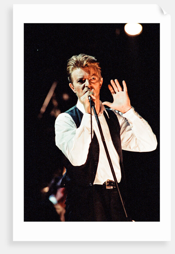 David Bowie performing at The Birmingham NEC, as part of his 1990 Sound and Vision World Tour. by Dick Williams