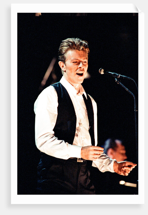 David Bowie performing at The Birmingham NEC, as part of his 1990 Sound and Vision World Tour. by Dick Williams
