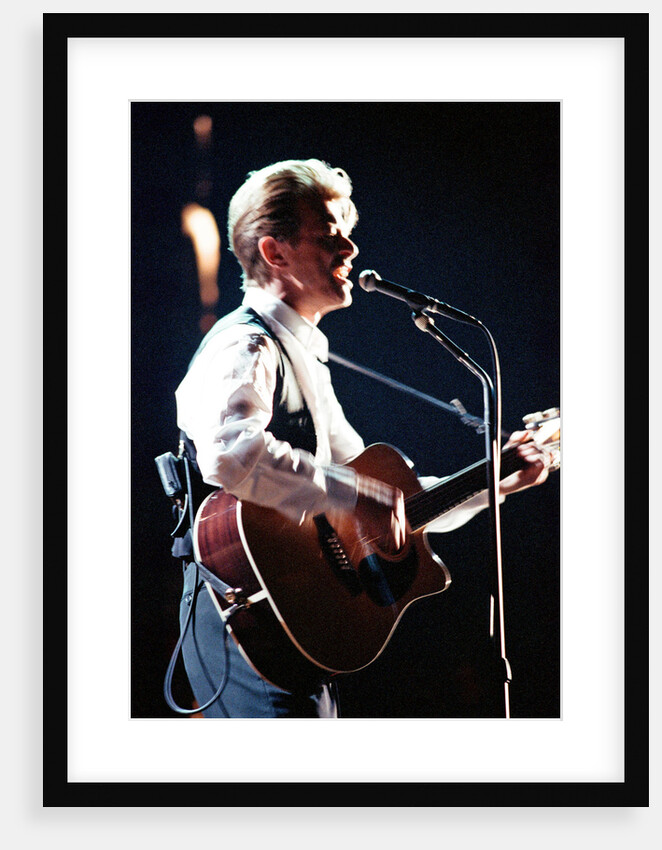 David Bowie performing at The Birmingham NEC, as part of his 1990 Sound and Vision World Tour. by Dick Williams