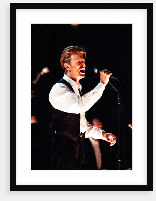 David Bowie performing at The Birmingham NEC, as part of his 1990 Sound and Vision World Tour. by Dick Williams