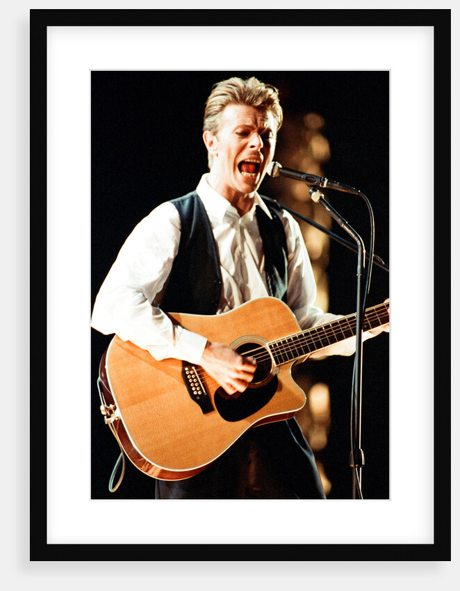 David Bowie performing at The Birmingham NEC, as part of his 1990 Sound and Vision World Tour. by Dick Williams