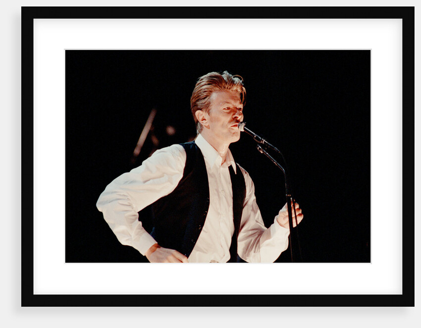 David Bowie performing at The Birmingham NEC, as part of his 1990 Sound and Vision World Tour. by Dick Williams