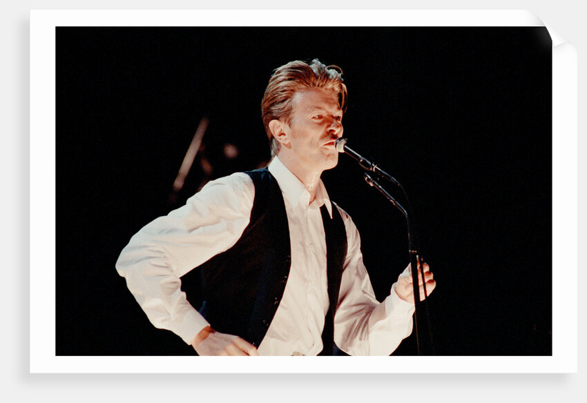 David Bowie performing at The Birmingham NEC, as part of his 1990 Sound and Vision World Tour. by Dick Williams