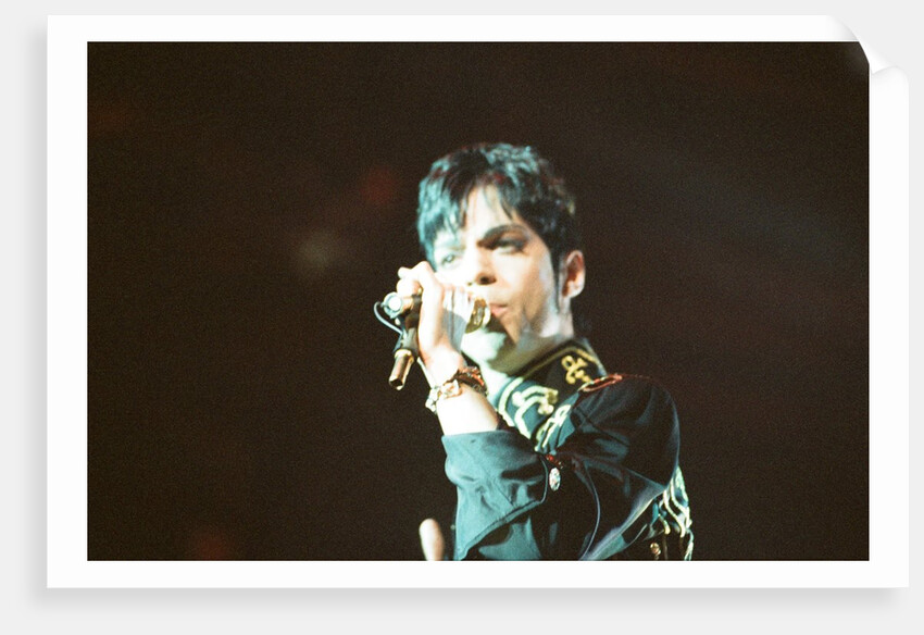 Prince performing on stage during his 'Ultimate Live Experience Tour' by Richard Nelmes