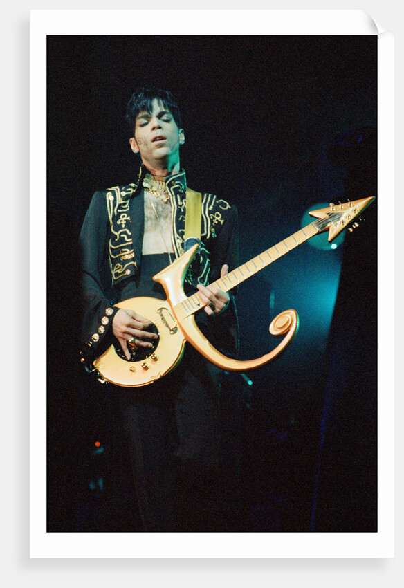 Prince performing on stage during his 'Ultimate Live Experience Tour' by Richard Nelmes