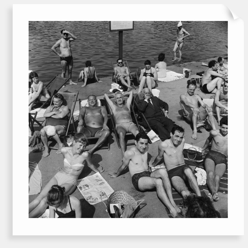 People sunbathing in a heatwave at the Serpentine Lido by Tommy Lea