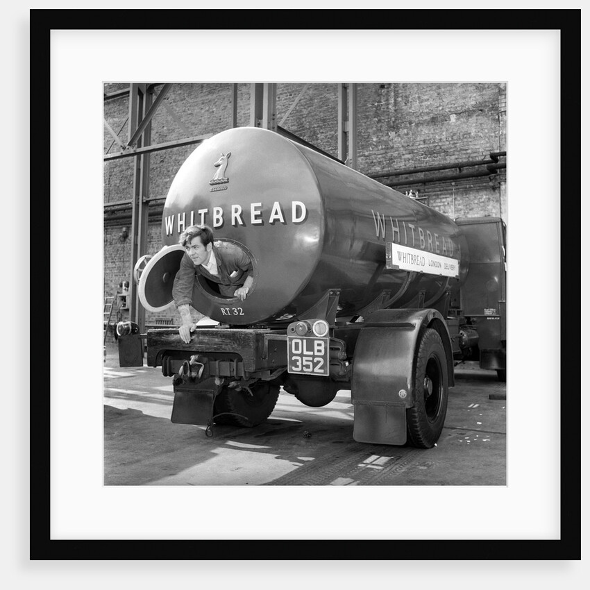 A tanker driver cleaning out the inside of his vehicle by Anonymous