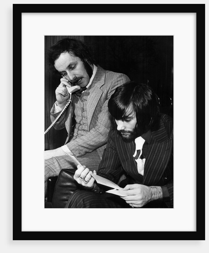 George Best and his business partner Malcolm Mooney by Staff