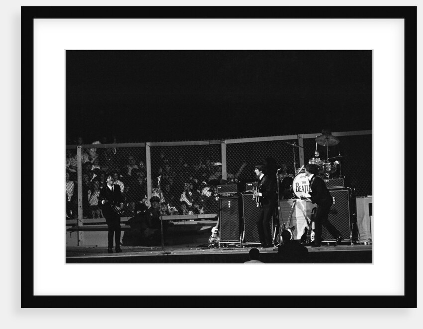 The Beatles on stage at the Cow Palace in San Francisco by Anonymous