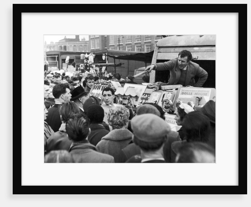A stall holder at Petticoat Lane market by Anonymous