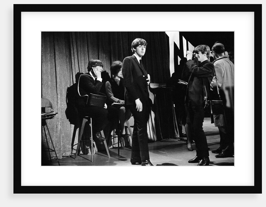 Ringo Starr taking pictures of Paul McCartney by Henry Grossman