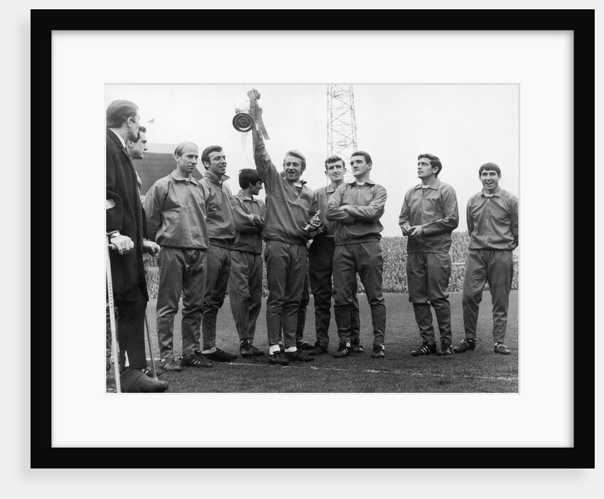 Dennis Law holding the Division One Championship trophy by Staff