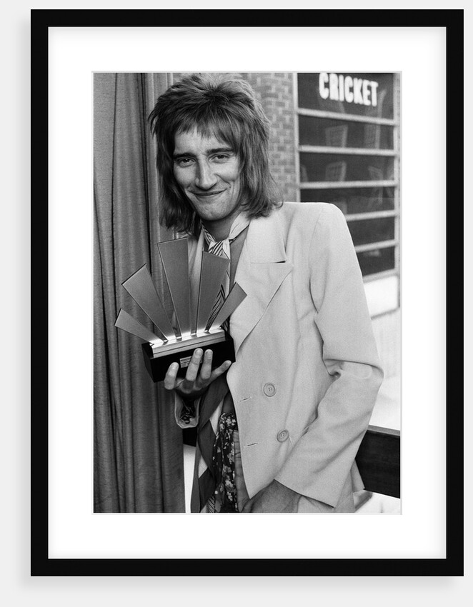 Rod Stewart with his Top Male Singer Award by Staff