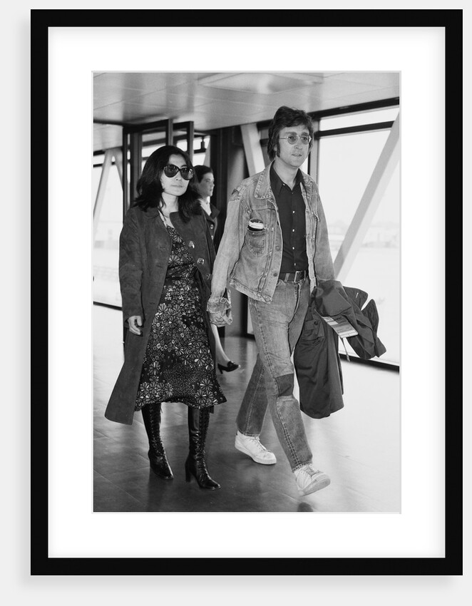 John Lennon with his wife Yoko Ono leaving Heathrow Airport by Anonymous
