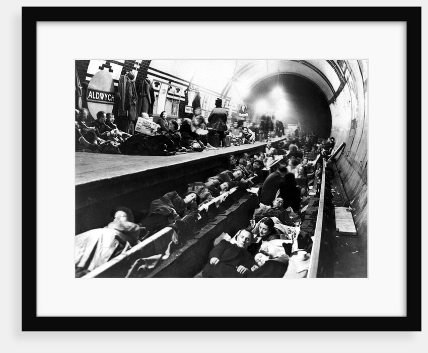 Londoners use Aldwych Underground Station as an air raid shelter by Staff