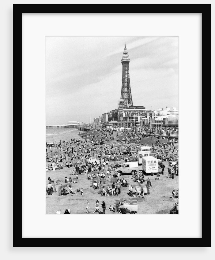 Blackpool Tower with people sitting on Blackpool Beach by Anonymous