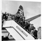 Everton team members wave before their plane departs from Speke airport by Charlie Owens