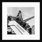 Everton team members wave before their plane departs from Speke airport by Charlie Owens
