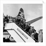 Everton team members wave before their plane departs from Speke airport by Charlie Owens