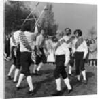 Morris dancer performing during the may day festival by Staff