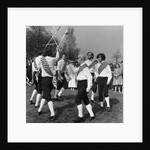 Morris dancer performing during the may day festival by Staff