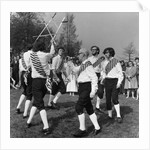Morris dancer performing during the may day festival by Staff
