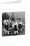 Morris dancer performing during the may day festival by Staff