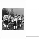 Morris dancer performing during the may day festival by Staff