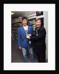 Alex Ferguson with Eric Cantona in a clothes shop by Holland
