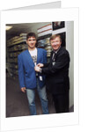 Alex Ferguson with Eric Cantona in a clothes shop by Holland