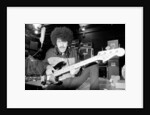 Phil Lynott of Thin Lizzy during a recording session for the groups new album. by Andy Hosie
