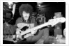 Phil Lynott of Thin Lizzy during a recording session for the groups new album. by Andy Hosie