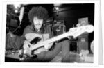 Phil Lynott of Thin Lizzy during a recording session for the groups new album. by Andy Hosie