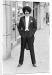 Phil Lynott in London, modelling clothes from Saville Row. 1983 by Mike Maloney