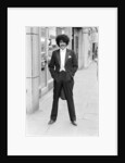 Phil Lynott in London, modelling clothes from Saville Row. 1983 by Mike Maloney